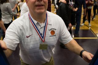 Rockne Roll/News-Register file photo##
Dayton head coach Scott Spink climbs the ladder to claim the net following the Pirates’ win in the OSAA Class 3A Basketball State Championship Game in March. He announced his retirement as coach at Dayton. Rockne Roll/News-Register file photo##
Dayton head coach Scott Spink climbs the ladder to claim the net following the Pirates’ win in the OSAA Class 3A Basketball State Championship Game in March. He announced his retirement as coach at Dayton.
