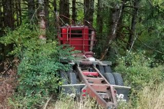Photo courtesy Oregon State Police##A log truck driver was killed Friday afternoon when his rig left Highway 22 in rural Yamhill County. Photo courtesy Oregon State Police##A log truck driver was killed Friday afternoon when his rig left Highway 22 in rural Yamhill County.