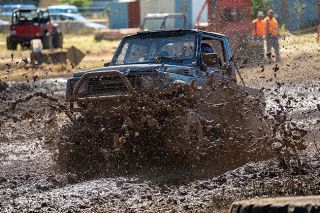 Rachel Thompson/News-Register##Kathy Cawley of Grand Ronde won the 8 Cylinder Stock/6 Cylinder Modified class in her 1987 Suzuki Samurai.