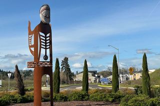 Kirby Neumann-Rea/News-Register##“Coyote” stands 12 feet tall in the roundabout at the intersection of Northeast Baker Creek and Hill roads.