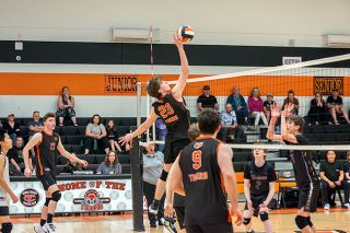 Emily Bonsant/News-Register##Senior Trey Jordahl leaps above the net for an attack at a recent home match against Horizon Christian/Tualatin. Emily Bonsant/News-Register##Senior Trey Jordahl leaps above the net for an attack at a recent home match against Horizon Christian/Tualatin.