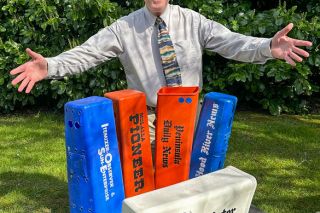 Submitted photo##The author with his collection of delivery tubes from every newspaper in his 44-year career. Submitted photo##The author with his collection of delivery tubes from every newspaper in his 44-year career.