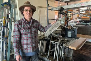 Rusty Rae/News-Register##Stephen Allen publishes The Condon Times Journal with his wife, Renee. The couple moved back to Oregon and purchased the paper to make a difference in the community. The linotype machine is a fixture in his office, which is housed in a 1902 building that he and Renee are just finishing remodeling. Rusty Rae/News-Register##Stephen Allen publishes The Condon Times Journal with his wife, Renee. The couple moved back to Oregon and purchased the paper to make a difference in the community. The linotype machine is a fixture in his office, which is housed in a 1902 building that he and Renee are just finishing remodeling.