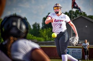 Photo courtesy of Amy Webster##Gabby Chupp throws a pitch during the Pirates’ quarterfinal game against Banks at Dayton High School. She pitched a complete seven innings while surrendering just four hits and two runs (one earned). Chupp also struck out six batters. Photo courtesy of Amy Webster##Gabby Chupp throws a pitch during the Pirates’ quarterfinal game against Banks at Dayton High School. She pitched a complete seven innings while surrendering just four hits and two runs (one earned). Chupp also struck out six batters.