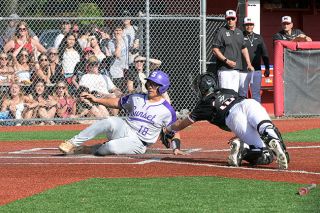 Rusty Rae/News-Register##McMinnville catcher Drew Bizon stretches for the tag after receiving a throw from center fielder Aaron Rolfe, but Sunset’s Dakota Chun gets to home plate first after tagging up on the play to tie the game 1-1 during Tuesday’s semifinal matchup. Rusty Rae/News-Register##McMinnville catcher Drew Bizon stretches for the tag after receiving a throw from center fielder Aaron Rolfe, but Sunset’s Dakota Chun gets to home plate first after tagging up on the play to tie the game 1-1 during Tuesday’s semifinal matchup.