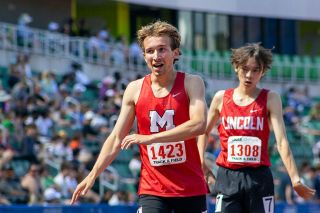 Nathan Ecker/News-Register##Gustav Blank slows down after crossing the finish line of the boys 1500-meter race at the track and field championships. He completed the race with a time of 3:59.58 and placed fifth on the podium. Nathan Ecker/News-Register##Gustav Blank slows down after crossing the finish line of the boys 1500-meter race at the track and field championships. He completed the race with a time of 3:59.58 and placed fifth on the podium.