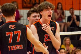 Emily Bonsant/News-Register##Senior outside hitter Trey Jordahl celebrates a kill with teammates in the Tigers match against Tualatin/Horizon Christian at Yamhill Carlton High School on April 18. Emily Bonsant/News-Register##Senior outside hitter Trey Jordahl celebrates a kill with teammates in the Tigers match against Tualatin/Horizon Christian at Yamhill Carlton High School on April 18.