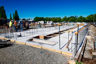 Rusty Rae/News-Register##Workers continue to lay the groundwork for the new Thoroughbred Express Car Wash at 1170 S.W. Booth Bend Road, near Lowe’s Home Improvement store. The 2,729-square-foot car wash building is being built at a cost of $450,000. Rusty Rae/News-Register##Workers continue to lay the groundwork for the new Thoroughbred Express Car Wash at 1170 S.W. Booth Bend Road, near Lowe’s Home Improvement store. The 2,729-square-foot car wash building is being built at a cost of $450,000.