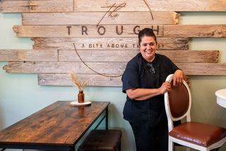 Rusty Rae/News-Register##Trough deli owner Tanya Weaver said she is pleased with her restaurant’s new location in an old house across from the Linfield University Oak Grove. The deli sells sandwiches, wraps, sides and salads — including make-your-own combinations from a salad bar. Rusty Rae/News-Register##Trough deli owner Tanya Weaver said she is pleased with her restaurant’s new location in an old house across from the Linfield University Oak Grove. The deli sells sandwiches, wraps, sides and salads — including make-your-own combinations from a salad bar.