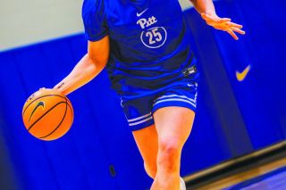 Macie Arzner drives to the basket during a preseason practice as a member of the University of Pittsburgh’s women’s basketball team. Arzner committed to Pitt in the summer of 2024 after a positive experience on her visit to the campus. “This is the place I gotta be,” she said.
Photo courtesy of Pitt Athletics Macie Arzner drives to the basket during a preseason practice as a member of the University of Pittsburgh’s women’s basketball team. Arzner committed to Pitt in the summer of 2024 after a positive experience on her visit to the campus. “This is the place I gotta be,” she said.
Photo courtesy of Pitt Athletics