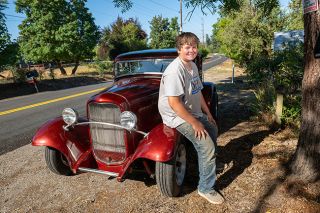 Rusty Rae/News-Register##Stephen Haller, a sophomore at Willamina High School, shows off the 1932 Ford Coupe hot rod that he spent nearly two years polishing and painting. Stephen said he loves hands-on projects, such as working on cars, welding and raising rabbits in FFA. Rusty Rae/News-Register##Stephen Haller, a sophomore at Willamina High School, shows off the 1932 Ford Coupe hot rod that he spent nearly two years polishing and painting. Stephen said he loves hands-on projects, such as working on cars, welding and raising rabbits in FFA.