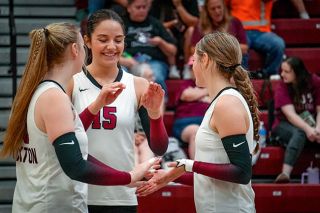 Senior Caterina Cicioni celebrates a point with a pair of teamates — Katie Freeborn and Maddie Miguez — during the Pirates match against Jefferson at Dayton High School.##Photo courtesy of Amy Webster Senior Caterina Cicioni celebrates a point with a pair of teamates — Katie Freeborn and Maddie Miguez — during the Pirates match against Jefferson at Dayton High School.##Photo courtesy of Amy Webster