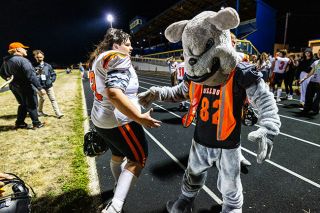 Willamina sophomore lineman Jacob Tucker daps up the team’s Bulldog mascot after their 41-0 victory over Sheridan at Bill Chrisman Memorial Field on Friday, Sept. 5.##Rachel Thompson/News-Register Willamina sophomore lineman Jacob Tucker daps up the team’s Bulldog mascot after their 41-0 victory over Sheridan at Bill Chrisman Memorial Field on Friday, Sept. 5.##Rachel Thompson/News-Register