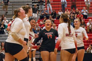 The Grizzlies celebrate a point won during the third set of play against Glencoe on Tuesday, Sept. 9. Sophomore defender Kiel Medrano (No. 4) helped Mac build momentum in the home league match and the team’s energy grew as they mounted a comeback down 0-2.##Nathan Ecker/News-Register The Grizzlies celebrate a point won during the third set of play against Glencoe on Tuesday, Sept. 9. Sophomore defender Kiel Medrano (No. 4) helped Mac build momentum in the home league match and the team’s energy grew as they mounted a comeback down 0-2.##Nathan Ecker/News-Register