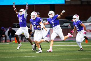 Rusty Rae/News-Register##Kenyon Johnson (No. 35), Max Kirsch (No. 9), Hudson Reink (No. 6) and Paavan Bankston (No. 23) celebrate an interception by Kirsh. He had two of the Wildcats three in the game. Rusty Rae/News-Register##Kenyon Johnson (No. 35), Max Kirsch (No. 9), Hudson Reink (No. 6) and Paavan Bankston (No. 23) celebrate an interception by Kirsh. He had two of the Wildcats three in the game.