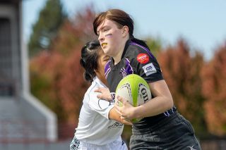 Nathan Ecker/News-Register file photo##McMinnville High School junior Ev Hane breaks past a defender during the Valley Panthers match against the Clark County Highlanders at Wortman Stadium on Saturday, Sept. 27. Hane scored a try and later stole the ball away in the closing seconds to give the Panthers a third place finish over the Portland Grackles. Nathan Ecker/News-Register file photo##McMinnville High School junior Ev Hane breaks past a defender during the Valley Panthers match against the Clark County Highlanders at Wortman Stadium on Saturday, Sept. 27. Hane scored a try and later stole the ball away in the closing seconds to give the Panthers a third place finish over the Portland Grackles.