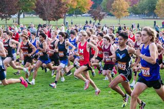 Rusty Rae/News-Register##Mac junior Isaiah Carpenter (No. 9224) finds his position in the middle of the pack after jumping off the starting line at the Grant Robison Invitational at Joe Dancer Park on Oct. 16. Rusty Rae/News-Register##Mac junior Isaiah Carpenter (No. 9224) finds his position in the middle of the pack after jumping off the starting line at the Grant Robison Invitational at Joe Dancer Park on Oct. 16.