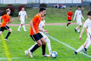 Nathan Ecker/News-Register## Lucas Partin takes on a Taft defender on an attack in the second half. YC trailed 1-0 at halftime and frantically forced attacks with some success in a comeback attempt. Nathan Ecker/News-Register## Lucas Partin takes on a Taft defender on an attack in the second half. YC trailed 1-0 at halftime and frantically forced attacks with some success in a comeback attempt.