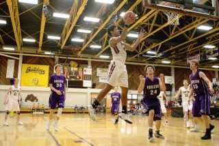 Rockne Roll/News-Register##
Dayton s Jalen Flowers flies to the hoop for a lay-in in the state quarterfinal game against Horizon Christian of Tualatin. Rockne Roll/News-Register##
Dayton s Jalen Flowers flies to the hoop for a lay-in in the state quarterfinal game against Horizon Christian of Tualatin.