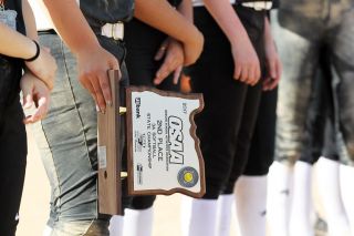 Rockne Roll/News-Register##
Dayton players stand with the second place trophy during the presentation of awards following the Pirates loss to the Rainier Columbians in the OSAA Class 3A Softball State Championship Game at Oregon State University in Corvallis on Friday, June. 2. Rockne Roll/News-Register##
Dayton players stand with the second place trophy during the presentation of awards following the Pirates loss to the Rainier Columbians in the OSAA Class 3A Softball State Championship Game at Oregon State University in Corvallis on Friday, June. 2.