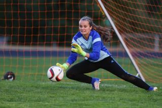 Rockne Roll/News-Register## Yamhill-Carlton goalkeeper Sage O Loughlin dives to collect a ball in front of her net in the Tigers Oregon West Conference match against North Marion Thursday, Sept. 21, at Laughlin Field in Yamhill. Rockne Roll/News-Register## Yamhill-Carlton goalkeeper Sage O Loughlin dives to collect a ball in front of her net in the Tigers Oregon West Conference match against North Marion Thursday, Sept. 21, at Laughlin Field in Yamhill.