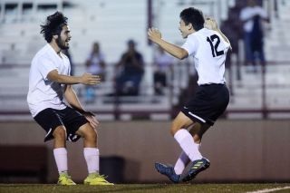 Rockne Roll/News-Register##Dayton s Enrique Rubio, right, celebrates his game-winning goal with Cristhian Garcia in the Pirates Class 3A/2A/1A Special District Two match against Western Mennonite/Perrydale at Gubser Field in Dayton Wednesday, Sept. 27. Rockne Roll/News-Register##Dayton s Enrique Rubio, right, celebrates his game-winning goal with Cristhian Garcia in the Pirates Class 3A/2A/1A Special District Two match against Western Mennonite/Perrydale at Gubser Field in Dayton Wednesday, Sept. 27.