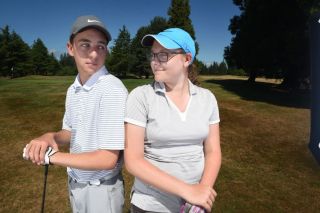 Rusty Rae/News-Register##
Sam and Molly Beyer challenge each other to improve each
round of golf. Rusty Rae/News-Register##
Sam and Molly Beyer challenge each other to improve each
round of golf.