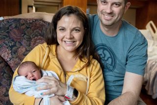 Rachel Thompson/News-Register##Samantha and David Farmer of McMinnville, with first 2023 baby Stanley, born 12 hour and 2 minutes into the new year.