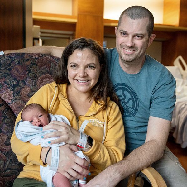 Rachel Thompson/News-Register##Samantha and David Farmer of McMinnville, with first 2023 baby Stanley, born 12 hour and 2 minutes into the new year.