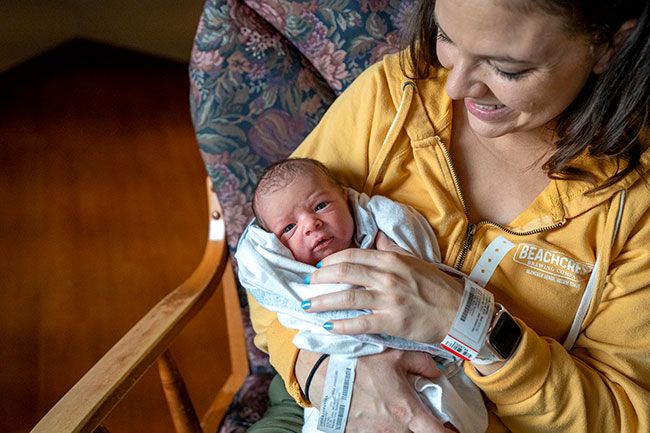 There was company waiting at home for McMinnville's first baby of '23