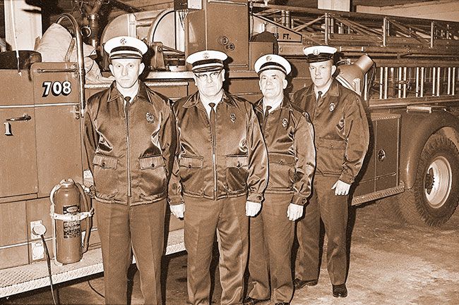 (January 3, 1968)##Starting the new year out right, McMinnville City Firemen received bright new uniforms consisting of blue jackets and pants and white hats. From left are Fire Chief Jerry Smith, Assistant Chief Roswell Rossner, Fire Marshal Charley Price and Captain Jan Fox.