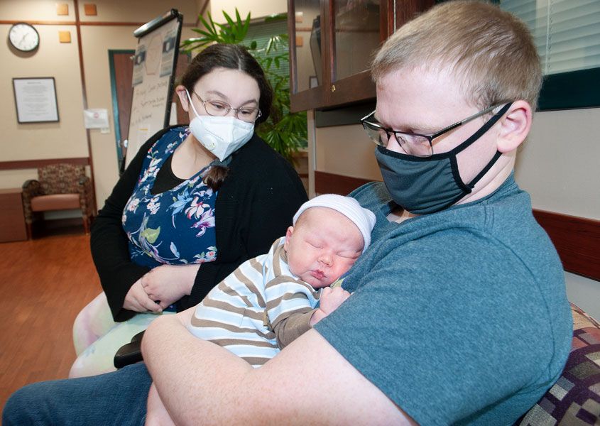 Rusty Rae/ News-Register ## 
Chasey and Scott Branton of McMinnville prepare to take Conner home from Willamette Valley Medical Center Sunday afternoon. The couple s first child was born at 9:03 a.m. New Year s Day.