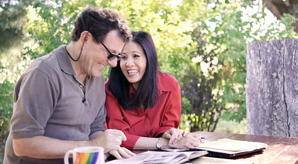 Show of Force photo##
Nicholas Kristof and Sheryl WuDunn look over some of his yearbooks from Yamhill Carlton High School, which he attended in the 1970s. The couple s new book is based on some of the people with whom Kristof grew up and attended school.