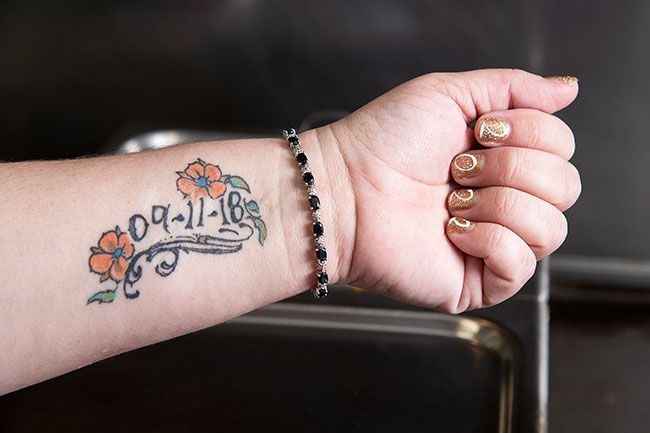 Rusty Rae/News-Register##A tattoo on Tierney Ferguson’s forearm commemorates the date she gave up drugs.