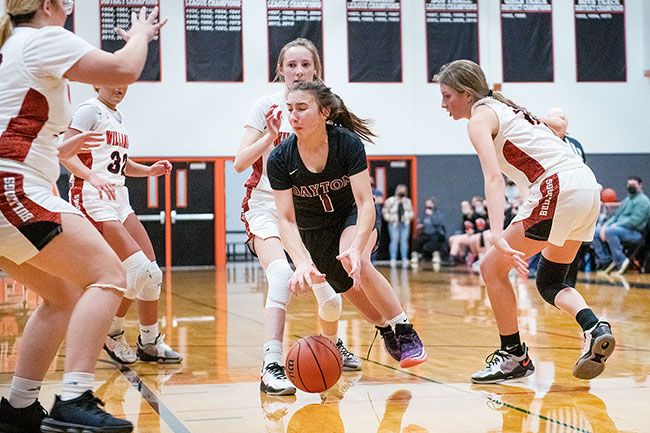 Rusty Rae/News-Register##
Willamina’s defense walls off Dayton’s freshman guard, Kya Lindell.