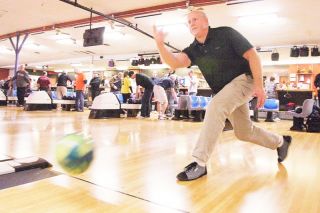 News-Register file photo##Phase 2 loosens restrictions on many activities, including bowling, arcades, batting cages and mini-golf,  with limits on occupancy and physical distancing.