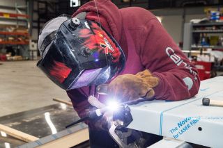 Marcus Larson/News-Register##
Mac High junior Amos Grell uses a TIG welder to fuse the corner of a sign he and Marckus Smith are making at Solid Form Fabrication. The teens learned fabrication basics at school. Marcus Larson/News-Register##
Mac High junior Amos Grell uses a TIG welder to fuse the corner of a sign he and Marckus Smith are making at Solid Form Fabrication. The teens learned fabrication basics at school.