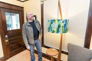 Marcus Larson/News-Register##Artist James Violette talks about one of his
creations, “Midmod Floor Lamp,” on display at The Gallery at Ten Oaks in McMinnville.