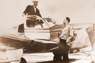 Image courtesy Mike Nolan##State Senate President Marshall Cornett, holding the door of his new Beechcraft Bonanza, chats with Dr. C.V. Hugh, who went with Cornett to pick up the airplane from the factory in Witchita earlier that year.