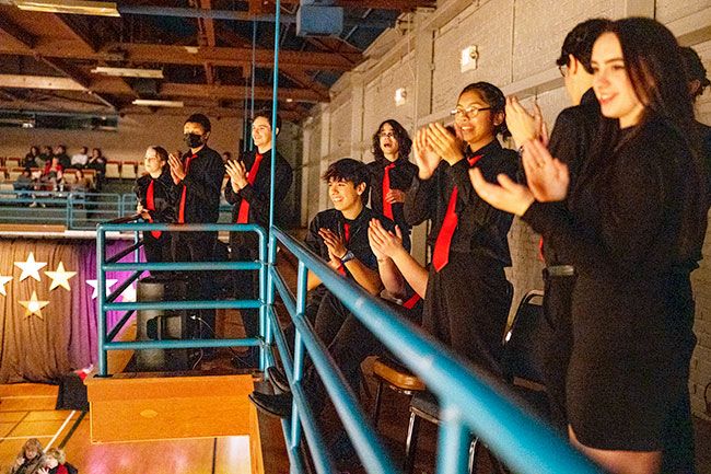 Rachel Thompson/News-Register##McMinnville 
High School 
Jazz Band members Makenzie 
Milam, left, 
Lukas Williams, 
Dustin Jacoby, 
Sebastian Carï¿½illo, Shae Bradï¿½shaw, Emily 
Angel, Ben 
Weisz, and Allie 
Shaver applaud 
for the 99 West 
Jazz Band, a 
subgroup of the 
Second Winds 
Community 
Band for adults