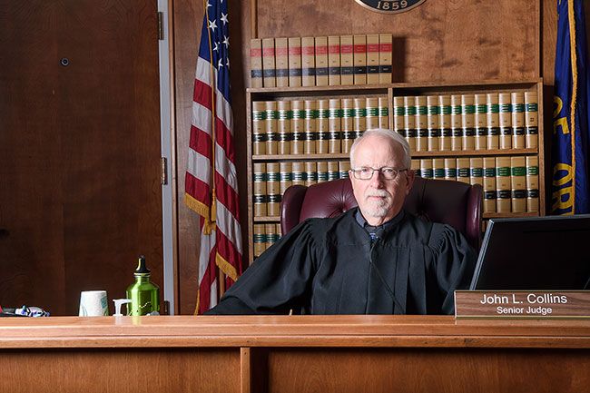 Rusty Rae/News-Register##Yamhill County Circuit Court Judge John Collins makes one of his final appearances in the courtroom. He officially retired Dec. 31 after nearly 30 years on the bench.