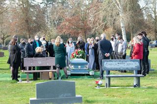 Marcus Larson/News-Register##Family members and friends of Monty Fergus say goodbye during a ceremony at Evergreen Memorial Park. The family held a small gathering in their church, but more people could attend the outdoor service. Marcus Larson/News-Register##Family members and friends of Monty Fergus say goodbye during a ceremony at Evergreen Memorial Park. The family held a small gathering in their church, but more people could attend the outdoor service.