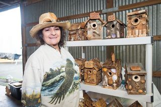 Marcus Larson/News-Register ## Mary Mayor uses found objects to embellish her whimsical birdhouses. Shells, nuts, corks and bits of moss are favorite materials. Marcus Larson/News-Register ## Mary Mayor uses found objects to embellish her whimsical birdhouses. Shells, nuts, corks and bits of moss are favorite materials.