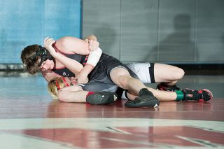 Rusty Rae/News-Register##
McMinnville 160-pounder Toby Stumpf looks to pin his opponent during Thursday’s league dual against Sherwood. Stumpf claimed a 4-2 decision in the match. Rusty Rae/News-Register##
McMinnville 160-pounder Toby Stumpf looks to pin his opponent during Thursday’s league dual against Sherwood. Stumpf claimed a 4-2 decision in the match.