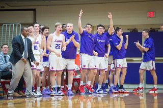 Marcus Larson/News-Register##
The Linfield men’s bench players leap to their feet to celebrate a steal and basket by a teammate during Friday’s 96-69 win over Puget Sound. Marcus Larson/News-Register##
The Linfield men’s bench players leap to their feet to celebrate a steal and basket by a teammate during Friday’s 96-69 win over Puget Sound.