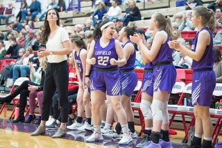 Marcus Larson/News-Register##
The Linfield women’s bench, led by Hanna Bingham (22) reacts to an exciting play against Pacific Lutheran Saturday. Linfield won the Northwest Conference matchup 75-71, led by Kory Oleson’s 26 points. Marcus Larson/News-Register##
The Linfield women’s bench, led by Hanna Bingham (22) reacts to an exciting play against Pacific Lutheran Saturday. Linfield won the Northwest Conference matchup 75-71, led by Kory Oleson’s 26 points.