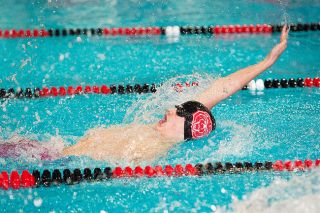 Marcus Larson/News-Register##
McMinnville swimmer Colin Bushey competes in the 100-yard backstroke during Friday’s Pacific Conference District Meet. Bushey, a freshman, won his event in a time of 54.79 seconds. Marcus Larson/News-Register##
McMinnville swimmer Colin Bushey competes in the 100-yard backstroke during Friday’s Pacific Conference District Meet. Bushey, a freshman, won his event in a time of 54.79 seconds.