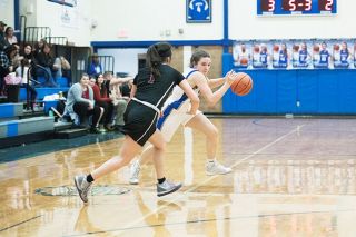 Rusty Rae/News-Register##
Amity freshman guard Ellie McMullen drives to her left as Dayton’s Yulisa Anguiano defends her. McMullen scored 10 points and had a clutch block on the Pirates’ potential game-tying three-pointer. Rusty Rae/News-Register##
Amity freshman guard Ellie McMullen drives to her left as Dayton’s Yulisa Anguiano defends her. McMullen scored 10 points and had a clutch block on the Pirates’ potential game-tying three-pointer.