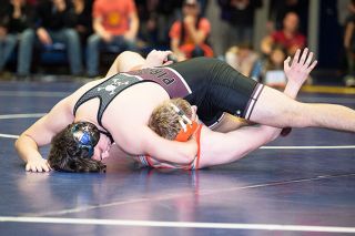 Marcus Larson/News-Register##
Dayton’s Daniel Garcia closes in on pinning his opponent, Yamhill-Carlton’s Dylan McInnis, in the 220-pound district final match. Marcus Larson/News-Register##
Dayton’s Daniel Garcia closes in on pinning his opponent, Yamhill-Carlton’s Dylan McInnis, in the 220-pound district final match.