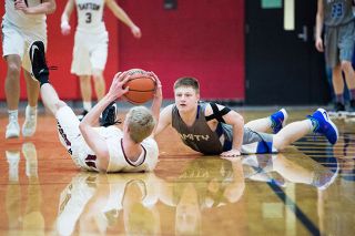 Marcus Larson/News-Register##
Dayton’s Dawson Ashley grabs a loose ball while Amity’s West Streeter looks on during Saturday’s PacWest final between the Pirates and Warriors, which Dayton won, 53-43. Marcus Larson/News-Register##
Dayton’s Dawson Ashley grabs a loose ball while Amity’s West Streeter looks on during Saturday’s PacWest final between the Pirates and Warriors, which Dayton won, 53-43.